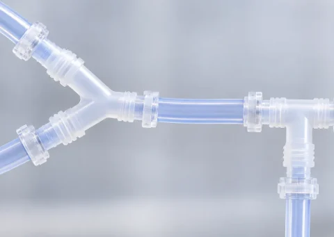 Clear Y and tee connectors joining soft medical tubing