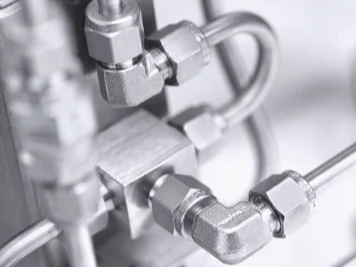 Stainless compression tube fittings on an instrument