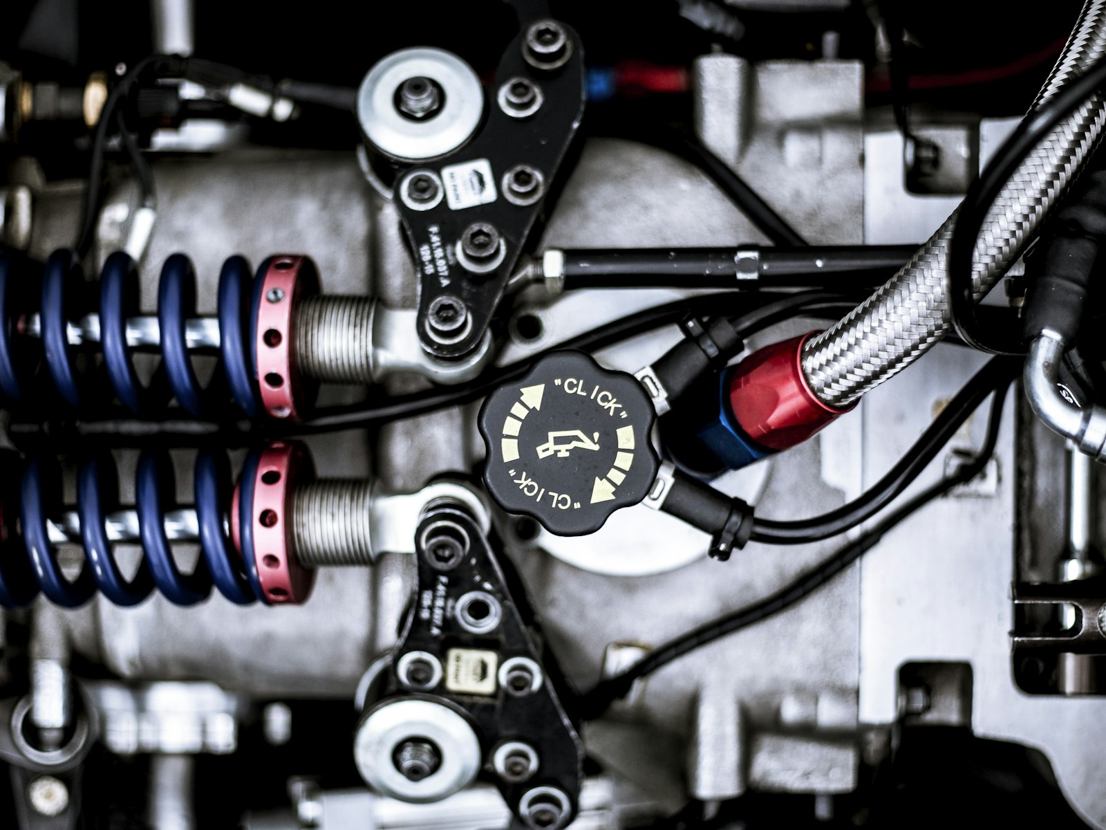 Engine bay with braided hoses and anodized fittings